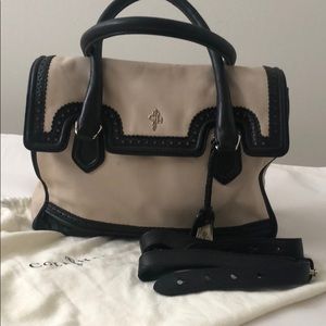 Cole Haan Leather black & white purse storage bag